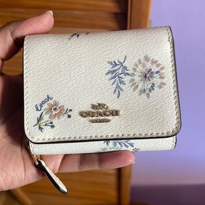 Coach floral mini wallet never used